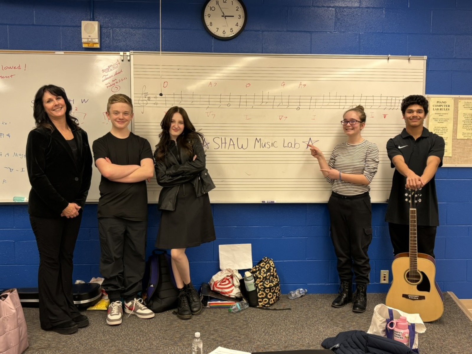 Shaw Music Lab students with their mentor in the music classroom